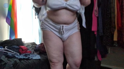 trying on random clothes and teasing the camera both with and without wearing my packer